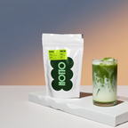 Hotto matcha powder package with a glass of iced matcha on a gradient background
